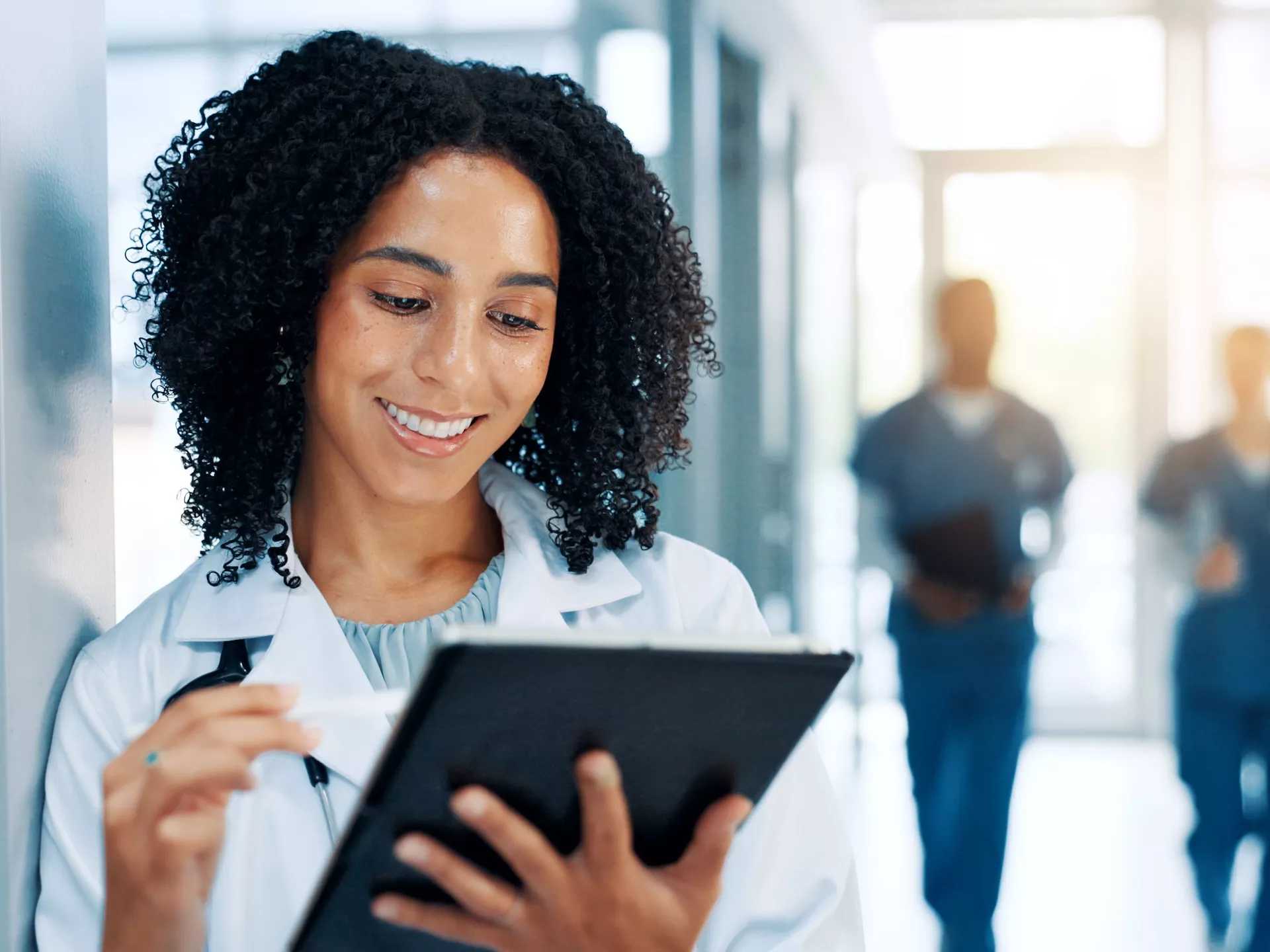Healthcare professional actively using Soundsuit on a tablet